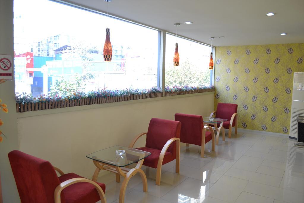 Qingdao Renjia Bussiness Hotel Værelse billede