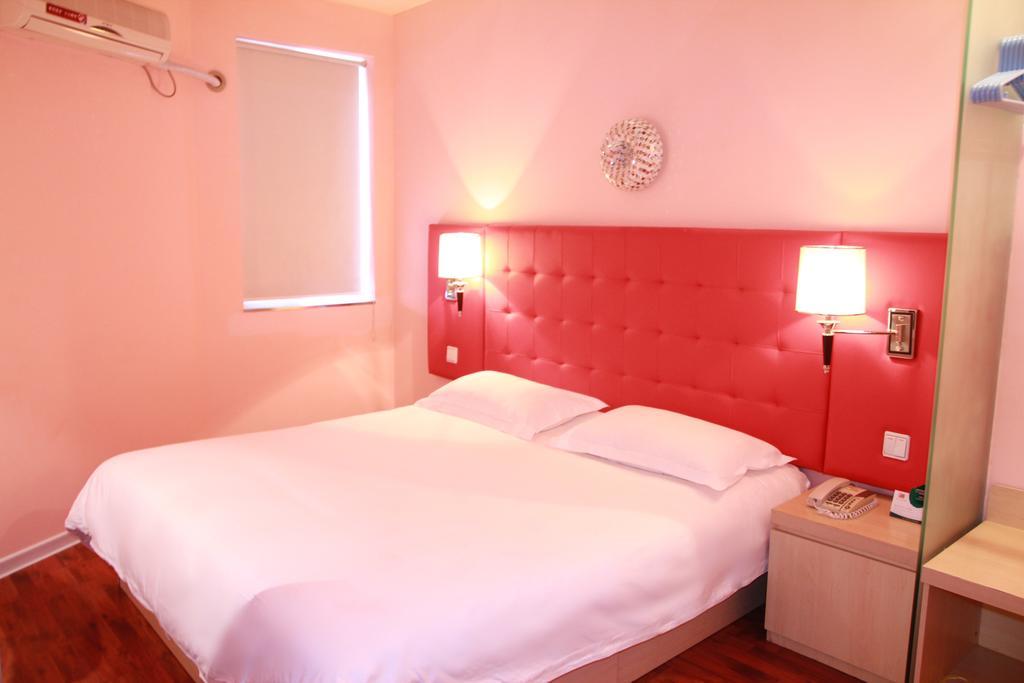 Qingdao Renjia Bussiness Hotel Værelse billede